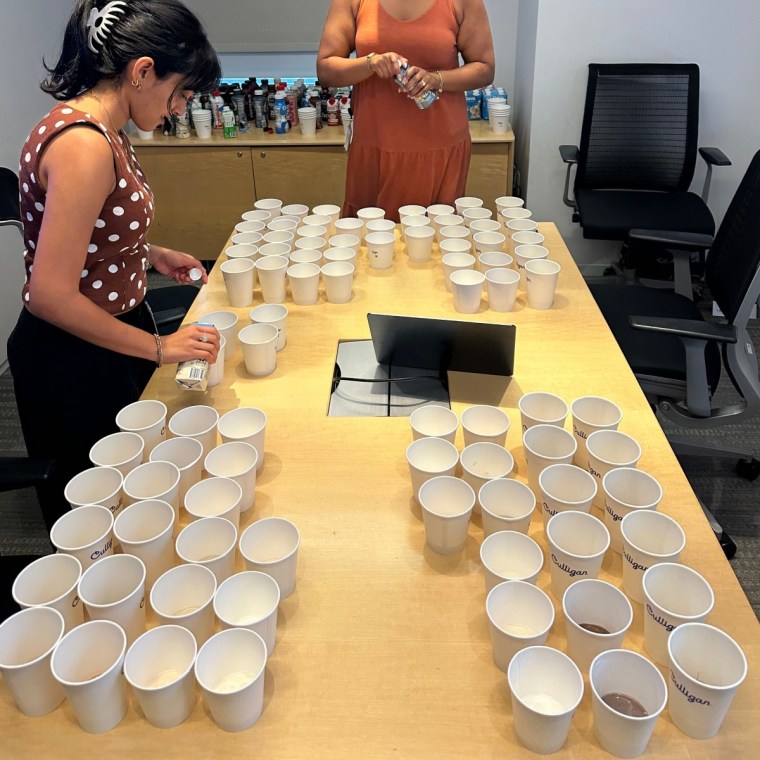 Setting up the first two rounds of taste tests for chocolate and vanilla protein shakes.