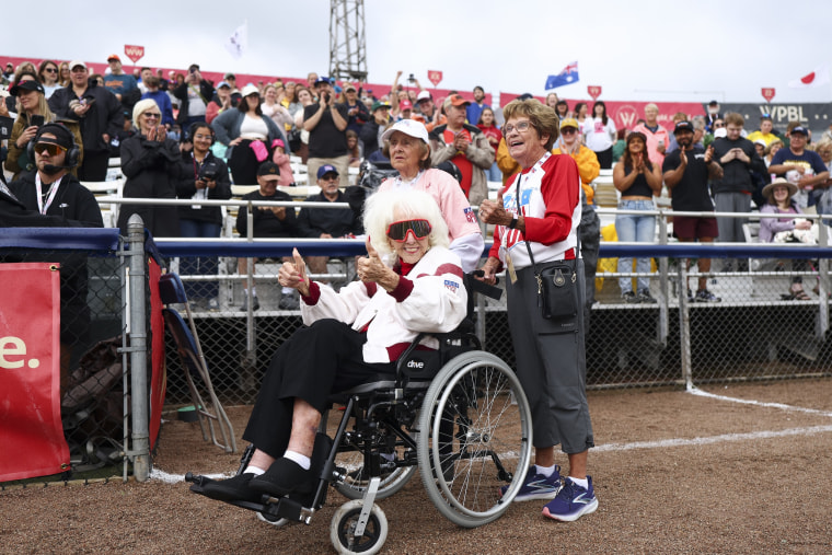 Former All-American Girls Professional Baseball League player Maybelle Blair poses for a photo before the Women's Pro Baseball League Opening Day between New York Heights and the Los Angeles Queens.