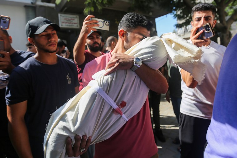 Gaza Residents Inspect Damage From Deadly Airstrike