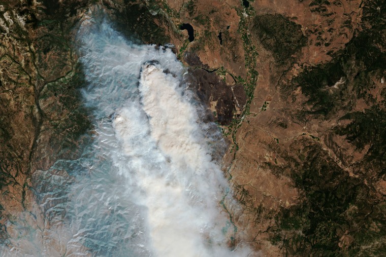 Satellite imagery showing smoke from fires in the Sinlahekin Wildlife Area, northwest of Spokane, on Tuesday.