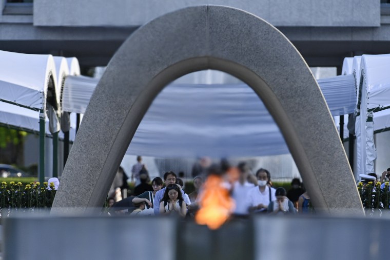 The Flame of Peace is seen through the arch of the cenotaph at Hiroshima Peace Memorial Park in Japan.