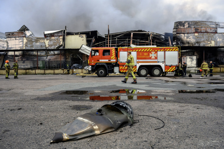 Part of a Russian ballistic missile lies near the site of a strike on a food warehouse in Kyiv, Ukraine, on Aug. 5, 2026.