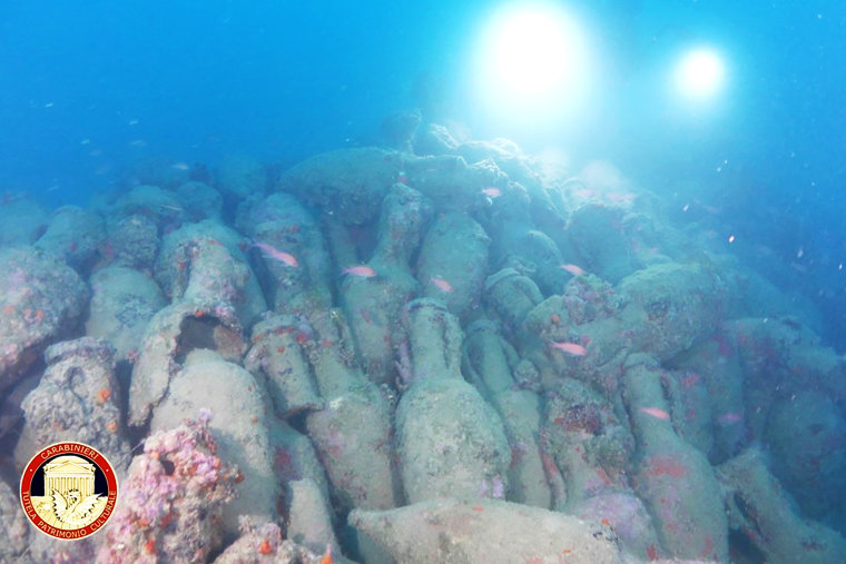 The amphorae were discovered inside the shipwreck, alongside lead anchor stocks and other artifacts.