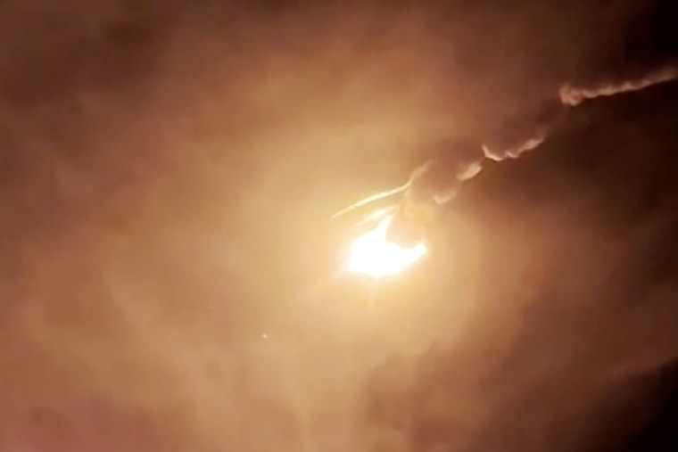 China's Long March 7A rocket appears to break apart after it exploded during liftoff from the Wenchang space launch site, in the southern island province of Hainan/