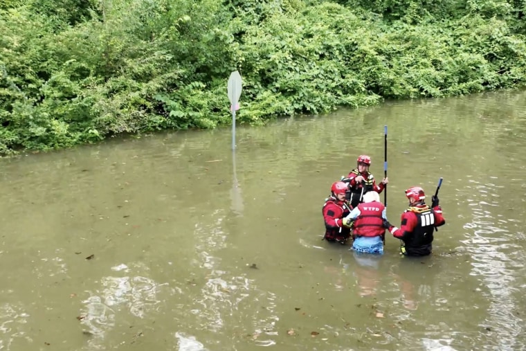 A frame-grab from aerial video showing flooding in a residential neighborhood.