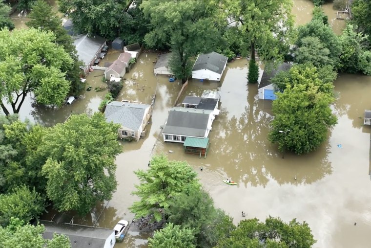 Flooding in the Ravenswood area of Indianapolis near the White River on Saturday.