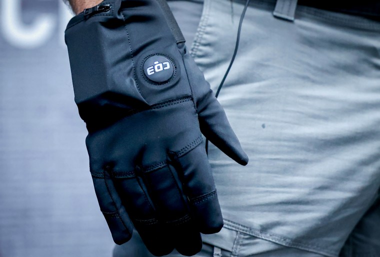 Justin Morris a distributor for Compliant Technologies wears the shock glove.