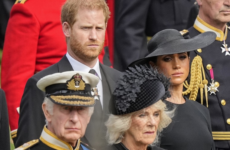 Prince Harry and Meghan, alongside Britain's King Charles and Camilla, during Queen Elizabeth II's funeral in London in Sept. 2022.