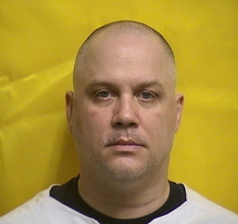Tyrone Noling's mugshot on a yellow background