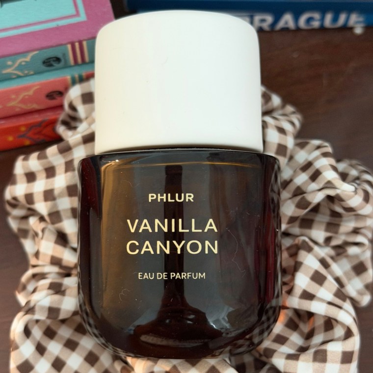 Phlur Vanilla Canyon on Gingham backdrop.