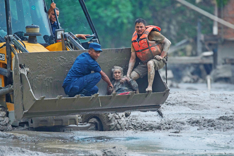 More than 150 dead and hundreds missing after flash floods hit Nepal-Tibet border