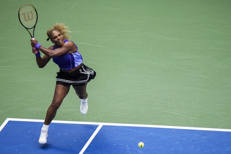 Serena Williams in action during a tennis game.