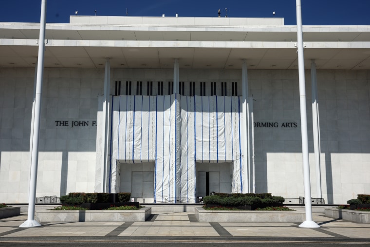 Tarp covering the sign at Kennedy Center