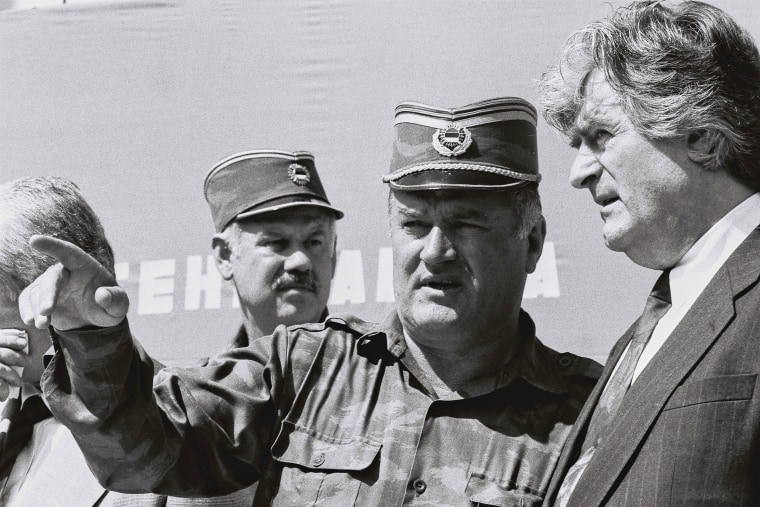 Bosnian Serb General Ratko Mladic speaks with Bosnian Serb President Radovan Karadzic, right, in the Bosnian town of Banja Luka, in 1994. 