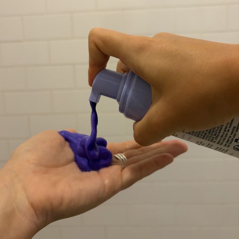 K18's purple shampoo comes out as a lightweight foam. 