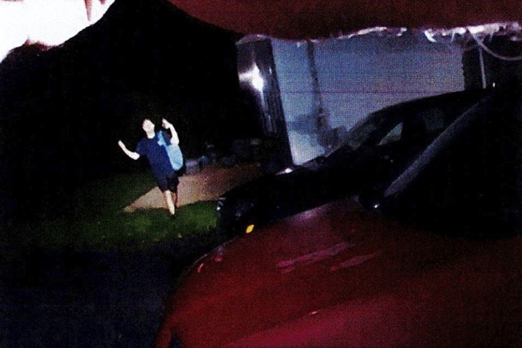 Body camera video shows Glenwood Earl Pysher IV arms up in a front yard.