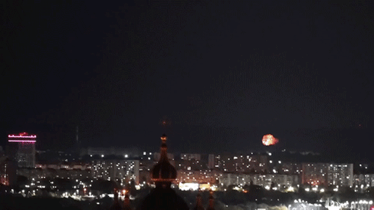 Image: A gif of video footage of an explosion and smoke seen over the Kyiv, Ukraine, skyline.
