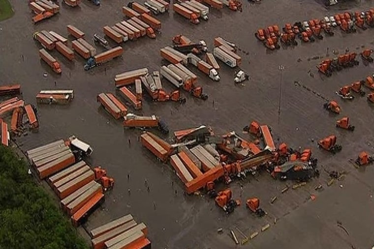 Damaged trucks and trailers are seen after a tornado pased through south Dallas on Tuesday.