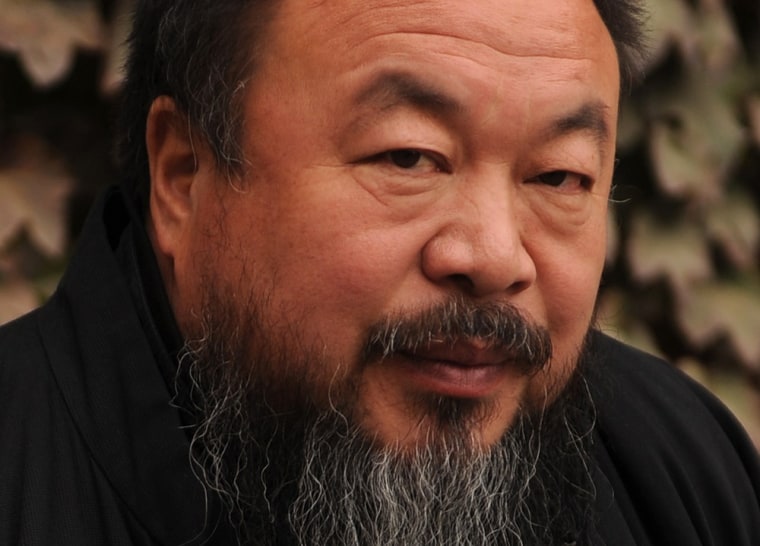 Chinese artist and dissident Ai Weiwei is seen in the courtyard of his home in Beijing in this file picture from November 2010.