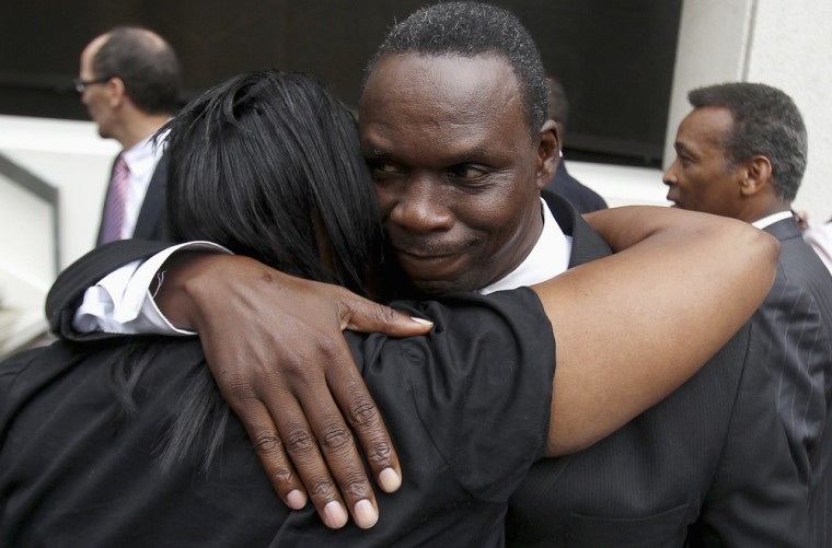 Sherrel Johnson, mother of James Brissette Jr., who was killed on the Danziger Bridge, is hugged by Rev. Aubrey Johnson after the sentencing of former New Orleans police officers on Wednesday.