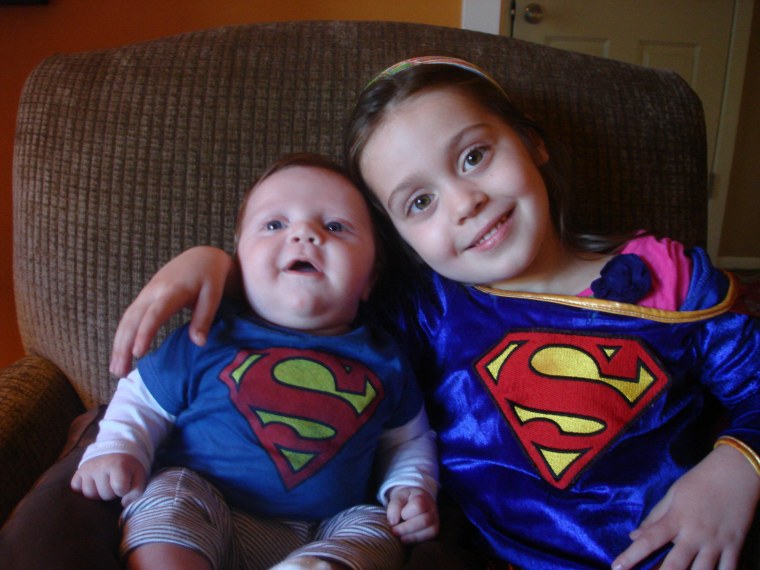 Amelia, 5, and Colin, 2 months: Sister and brother saving the world together!