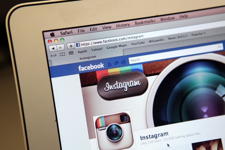 In this photo illustration, the photo-sharing app Instagram fan page is seen on the Facebook website on the Apple Safari web browser. Facebook Inc. is acquiring photo-sharing app Instagram for approx. $1 billion.