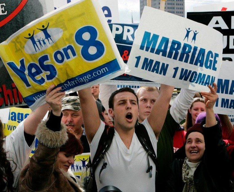 An opponent of Proposition 8, California's voter-approved ban on same-sex nuptials, has his sign blocked by supporters during a demonstration in San Francisco, Thursday, March 5, 2009.