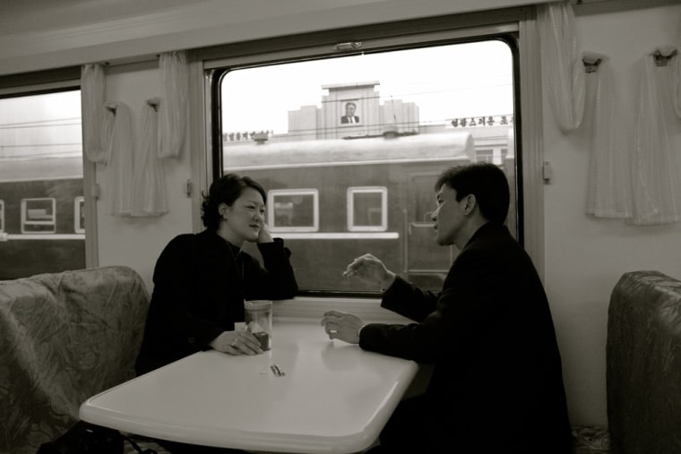 With so many journalists around and virtually all of our movement pre-planned by government-assigned minders, it's rare that you get a natural moment. The omnipresent President Kim Il-sung smiles down approvingly from his perch atop a train station.