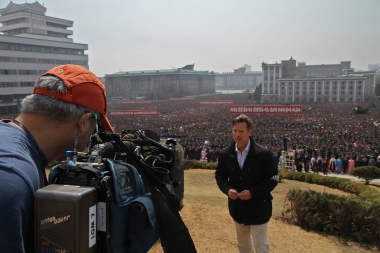 NBC News Senior Foreign Corespondent Richard Engel reports in front of tens of thousands just outside Kim Il-sung square in Pyongyang, North Korea on April 9, 2012.