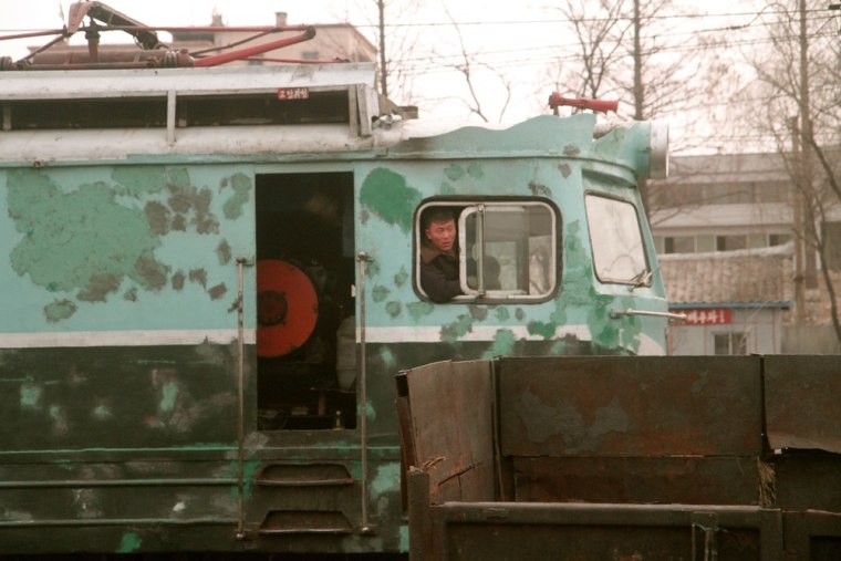 On the train to the Sohae Satellite Launching Station on Sunday, our immaculate private train car frequently passed older models that serviced everyday North Koreans.