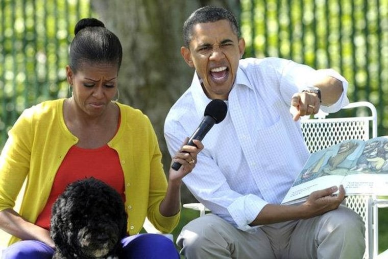 The Obamas during a very dramatic story time on Sunday.