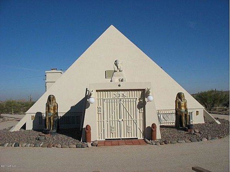 This Arizona pyramid even has golden statues framing the front entrance.
