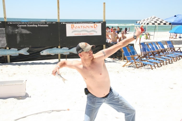 The mullet toss in Pensacola, Fla., features contestants hurling the small saltwater fish as far as they can into Alabama.