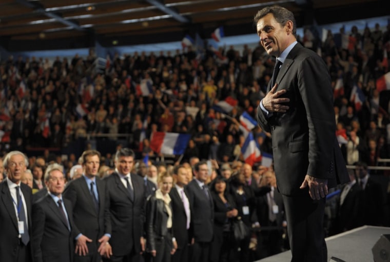 Nicolas Sarkozy, France's President and UMP party candidate for the 2012 French presidential election, leaves the stage after delivering a speech at a campaign rally in Saint-Brice-sous-Foret, Paris suburb, April 12, 2012.