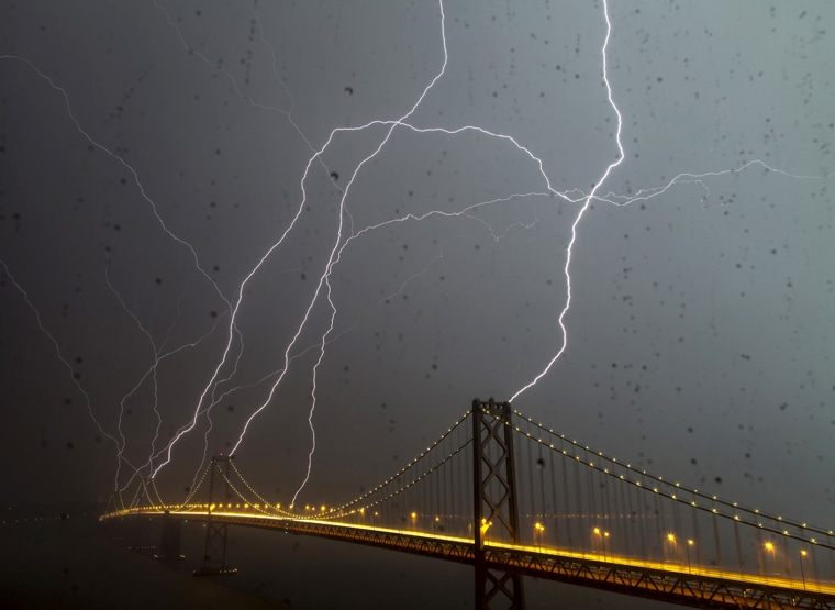 San Francisco photographer Phil McGrew says he has been trying to make a picture like this since he moved there two years ago. Thursday's violent storm finally allowed McGrew the oppertunity to make the picture, but he says he made it from inside the window of his appartment becuase he didn't want to get his camera wet.