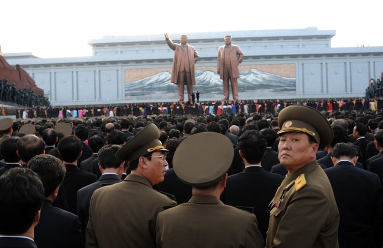 After Friday's rocket launch failure, North Korean military officials attend the unveiling ceremony of two statues of former leaders Kim Il-Sung and Kim Jong-Il in Pyongyang.