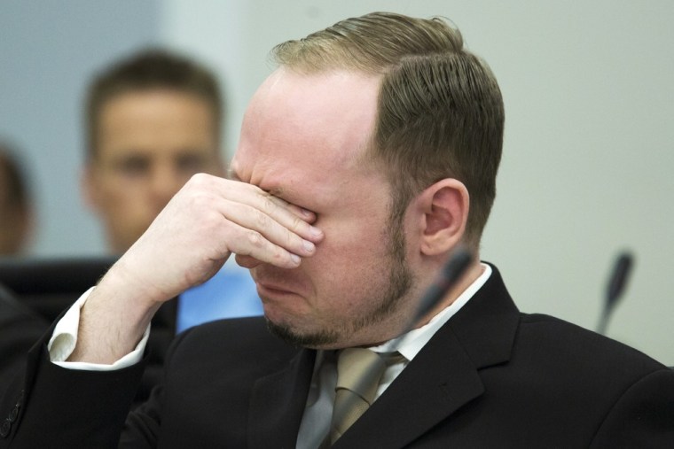 Anders Behring Breivik sheds a tear as the court views a propaganda film he made before he carried out the deadliest attacks in post-war Norwegian history.