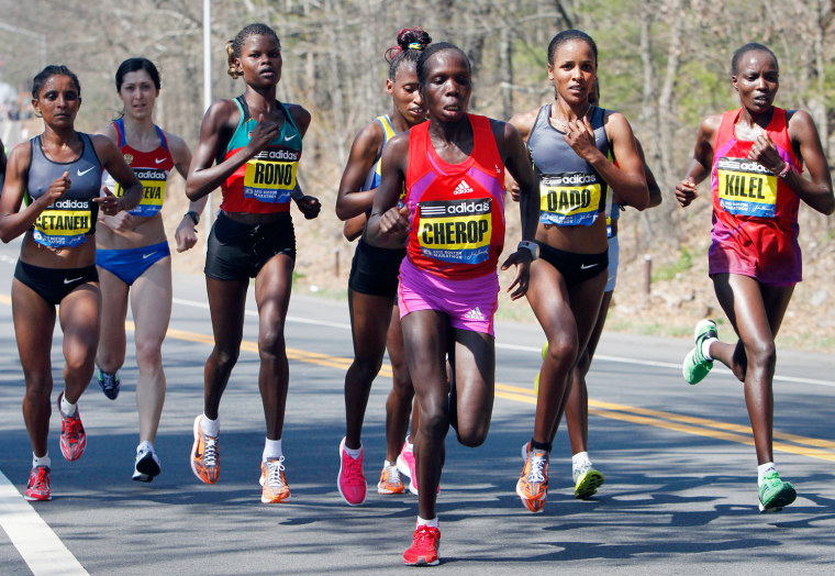 Boston Marathon runners take off in record-high heat