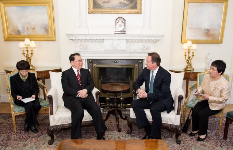 Chinese Communist Party official Li Changchun and British Prime Minister David Cameron met at Downing Street Tuesday.
