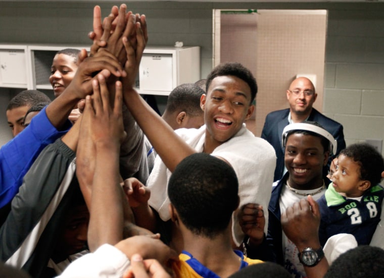 Parker celebrates with his Simeon Career Academy teammates after winning an Illinois state super sectional playoff game on March 13, 2012. For all the attention Jabari gets, Simeon coach Robert Smith says: