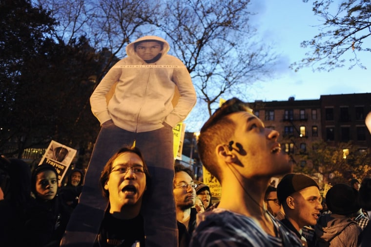 People march in a rally in support of slain teenager Trayvon Martin in New York on April 10. Martin's death led to protests nationwide.