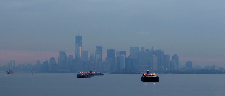 Lower Manhattan's skyline is seen at dawn from the Titanic Memorial Cruise ship MS Balmoral, as it arrives in New York City on April 19. The ship had sailed from Southampton, retracing the route of the ill fated Titanic liner which sank after hitting an iceberg 100 years ago.