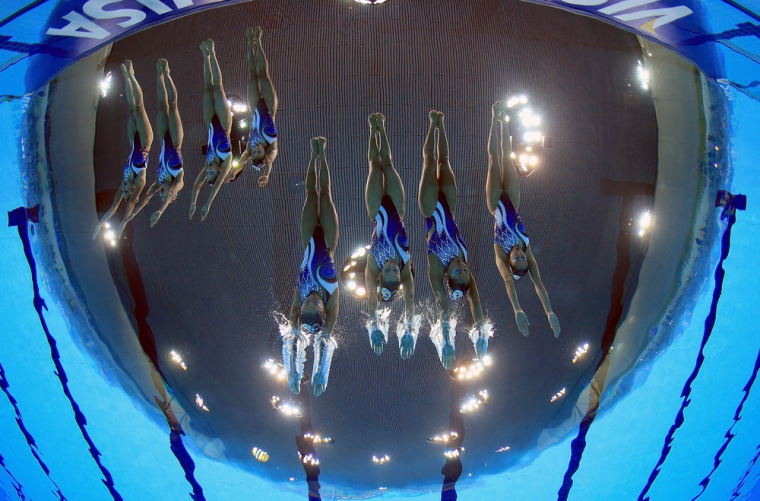 The Japan team competes in the team technical routine during the FINA Olympic games synchronized swimming qualification event at the London Aquatics Centre on April 19 in London, England.