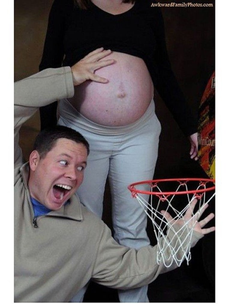Excited dad knows his newborn will be a slam dunk.