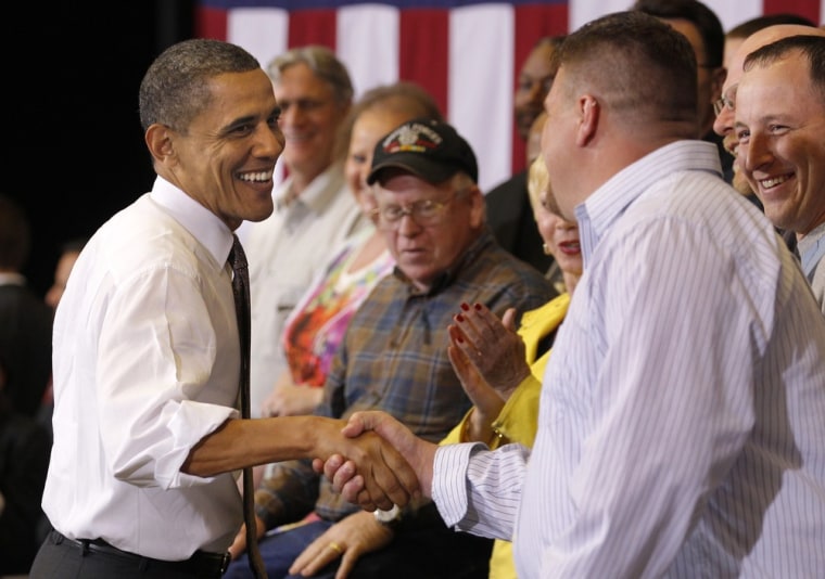President Barack Obama shakes hands with Lorain County Community College student Bronson Harwood after speaking at the college in Elyria, Ohio, on Wednesday, April 18, 2012.