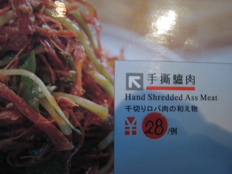 \"Hand Shredded Ass Meat\" is an unusual translation of an item at a Beijing noodle restaurant NBC's Bo Gu saw recently.