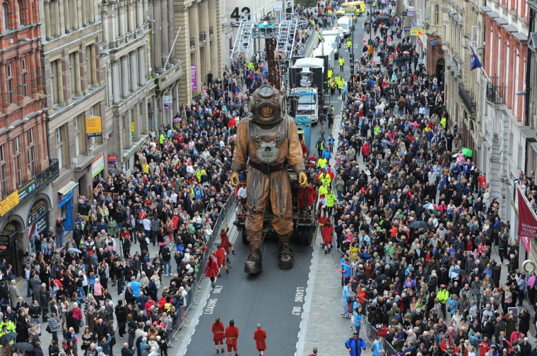 A giant deep sea diver puppet, part of a street theatre production entitled