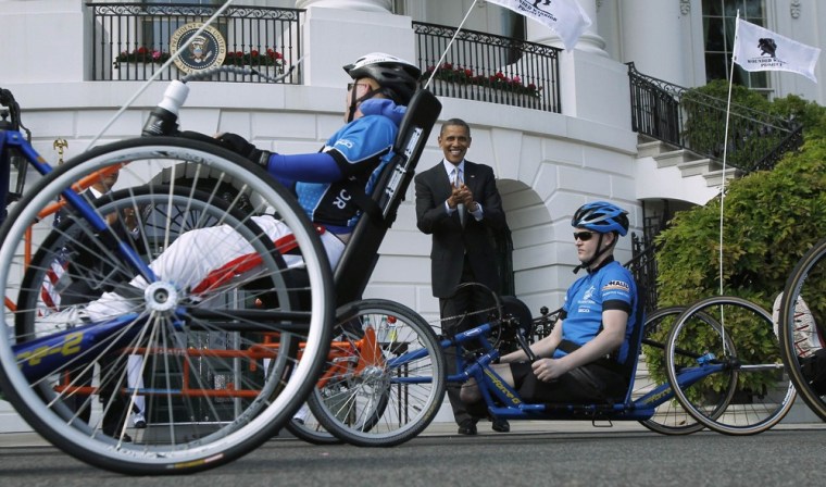 President Barack Obama sends off participants of the Wounded Warrior Project's Soldier Ride, on the South Lawn of the White House in Washington D.C. on April 20.