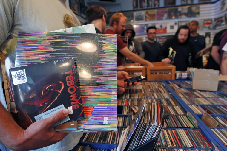 Buyers browse the selections on the fifth annual Record Store Day at Main Street Music, April 21, in Philadelphia.