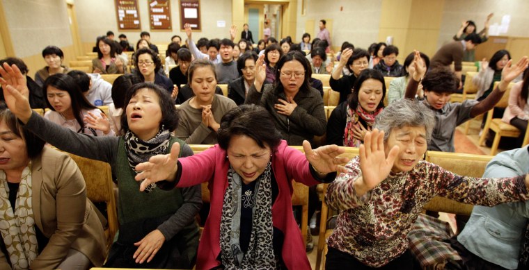 South Korean Christians pray during a service as they call for the cancellation of a concert of U.S. pop star Lady Gaga at a church in Seoul, South Korea, April 22. Lady Gaga's April 27 concert in Seoul was banned to under-18s by the Korea Media Rating Board as the Gender Equality Ministry considers one of her songs to be performed at the show as